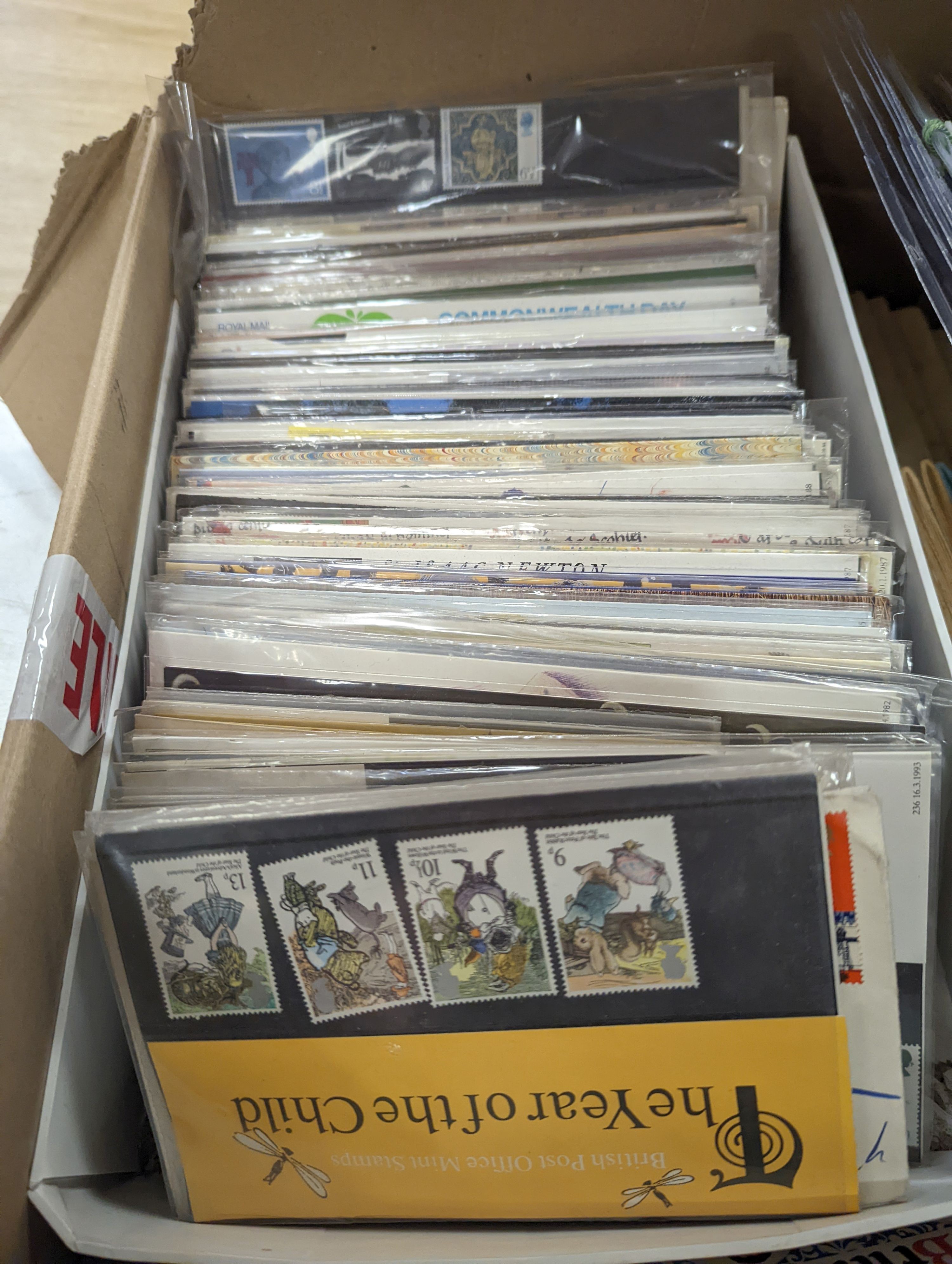 A quantity of First Day Covers and cigarette cards